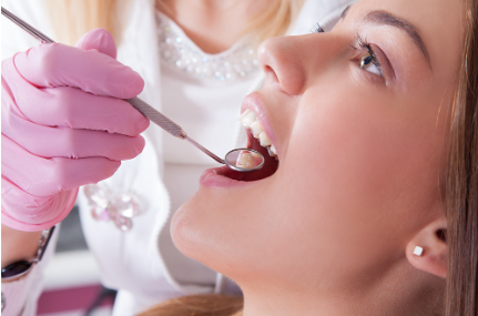 A girl getting her routine dental check-up.