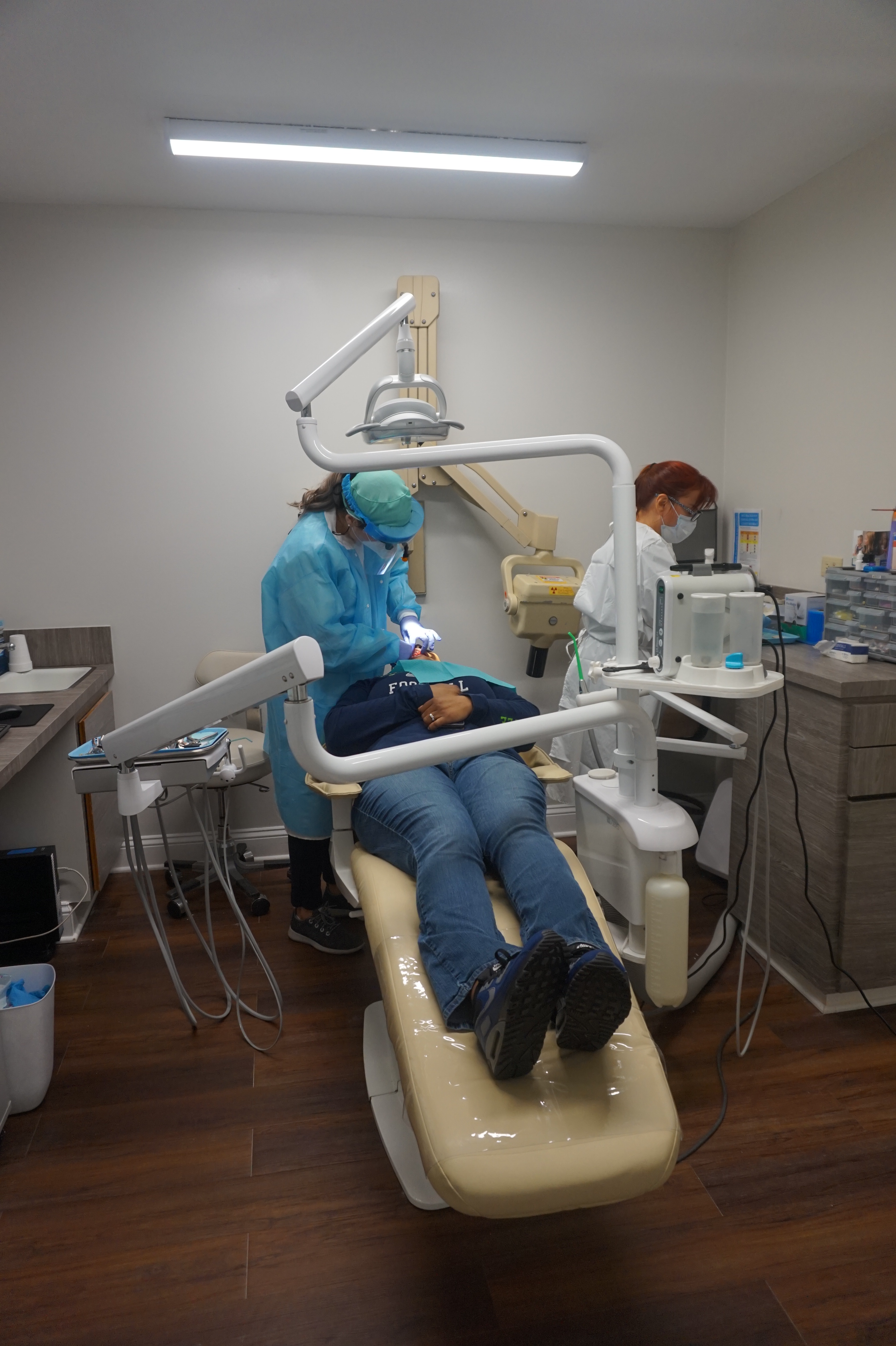 An Individual in a Reclining Position During a Dental Procedure in Jacksonville, FL